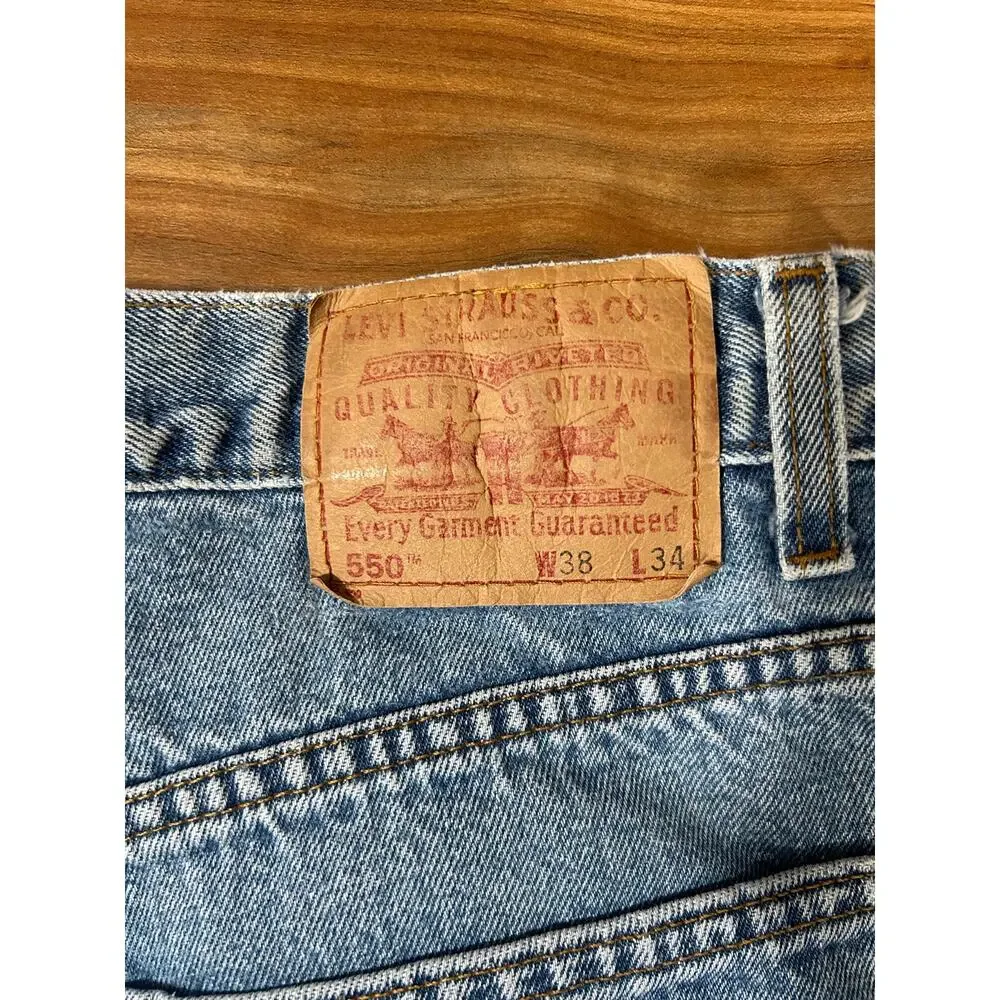 Vintage 90s Levi’s 550 Relaxed Fit Tapered Leg Jeans 38x34 Light Wash Distressed